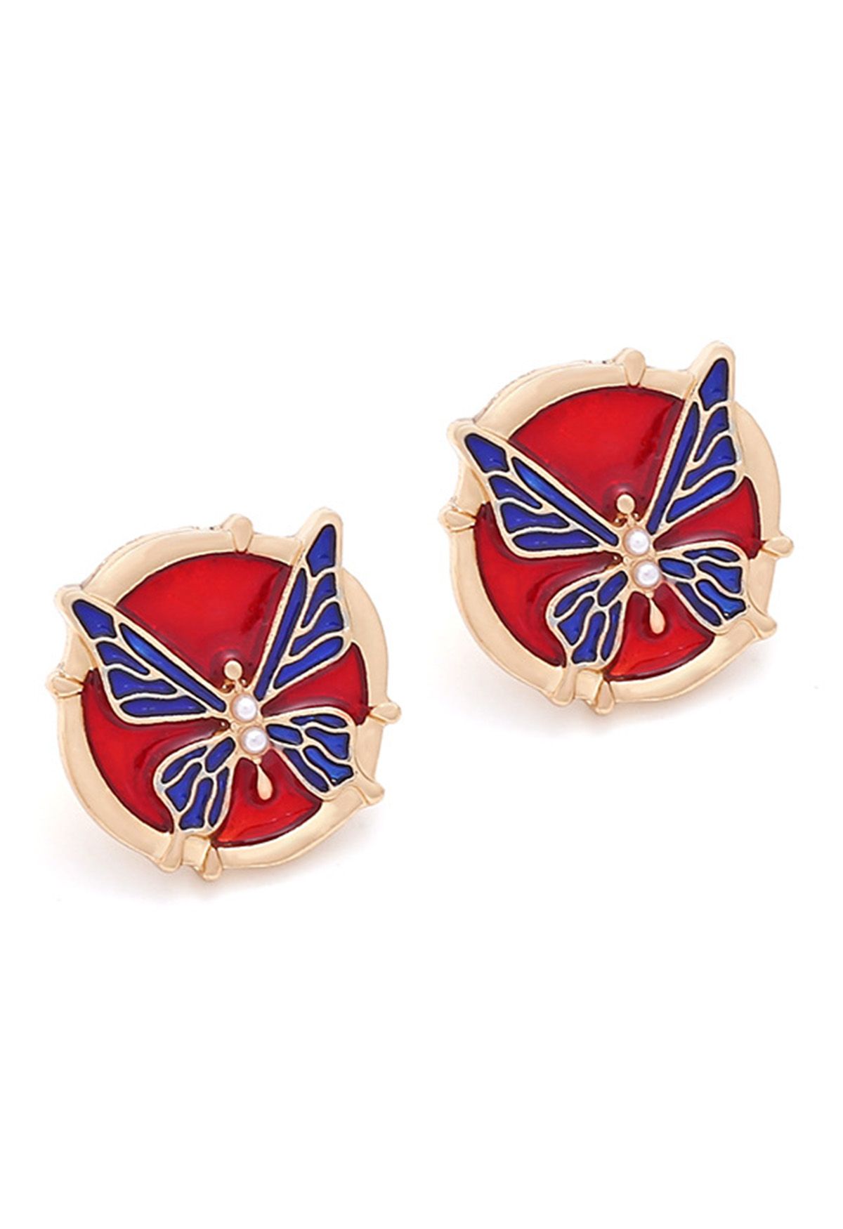Blaue Schmetterlings-Ohrringe aus Metall, aus denen Öl ausläuft