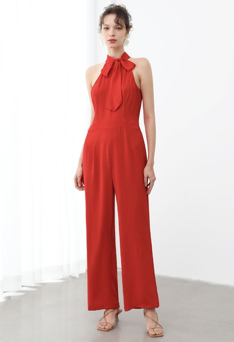 Eleganter Neckholder-Jumpsuit mit Schleife in Orange