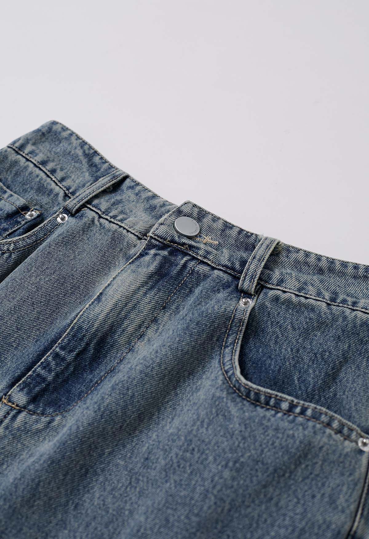 Ausgestellter Jeansrock mit Taschenbesatz und Gürtel in Blau