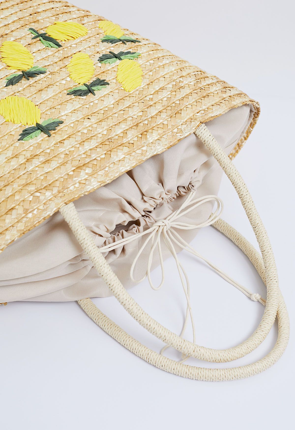 Handgemachte Strandtasche aus gewebtem Stroh mit Zitronenmuster