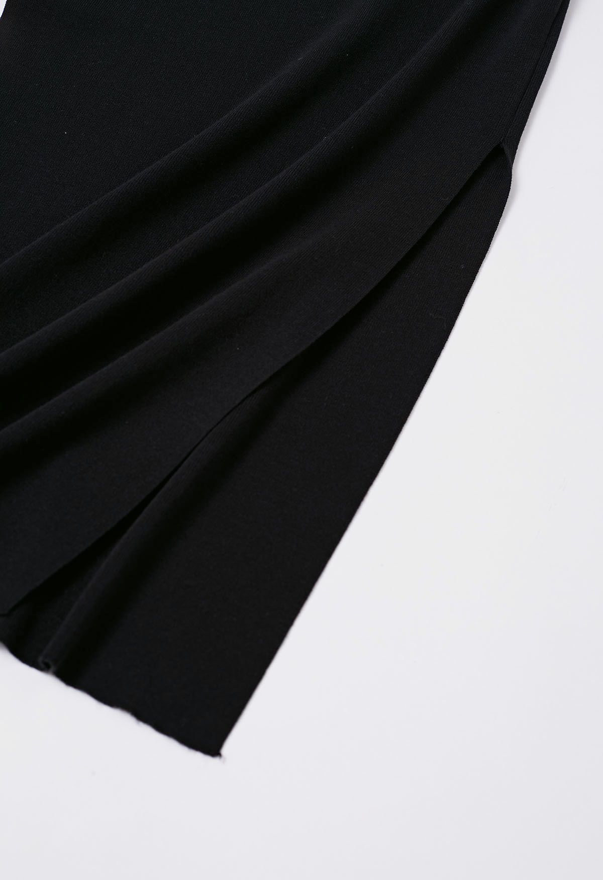Figurbetontes Strickkleid mit seitlichem Schleifenausschnitt in Schwarz