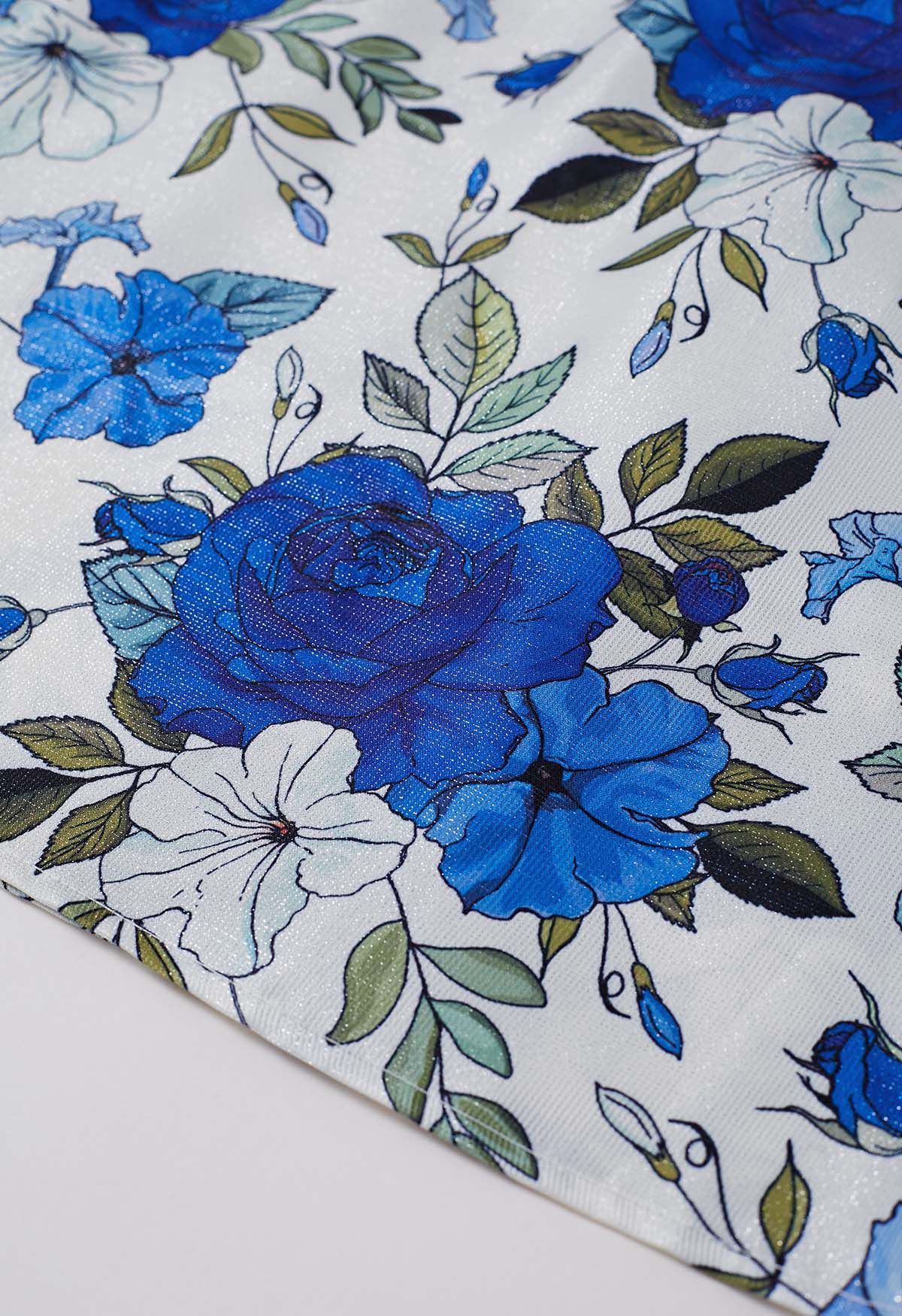 Schimmernder, blauer ausgestellter Midirock mit Rosen-Plissee