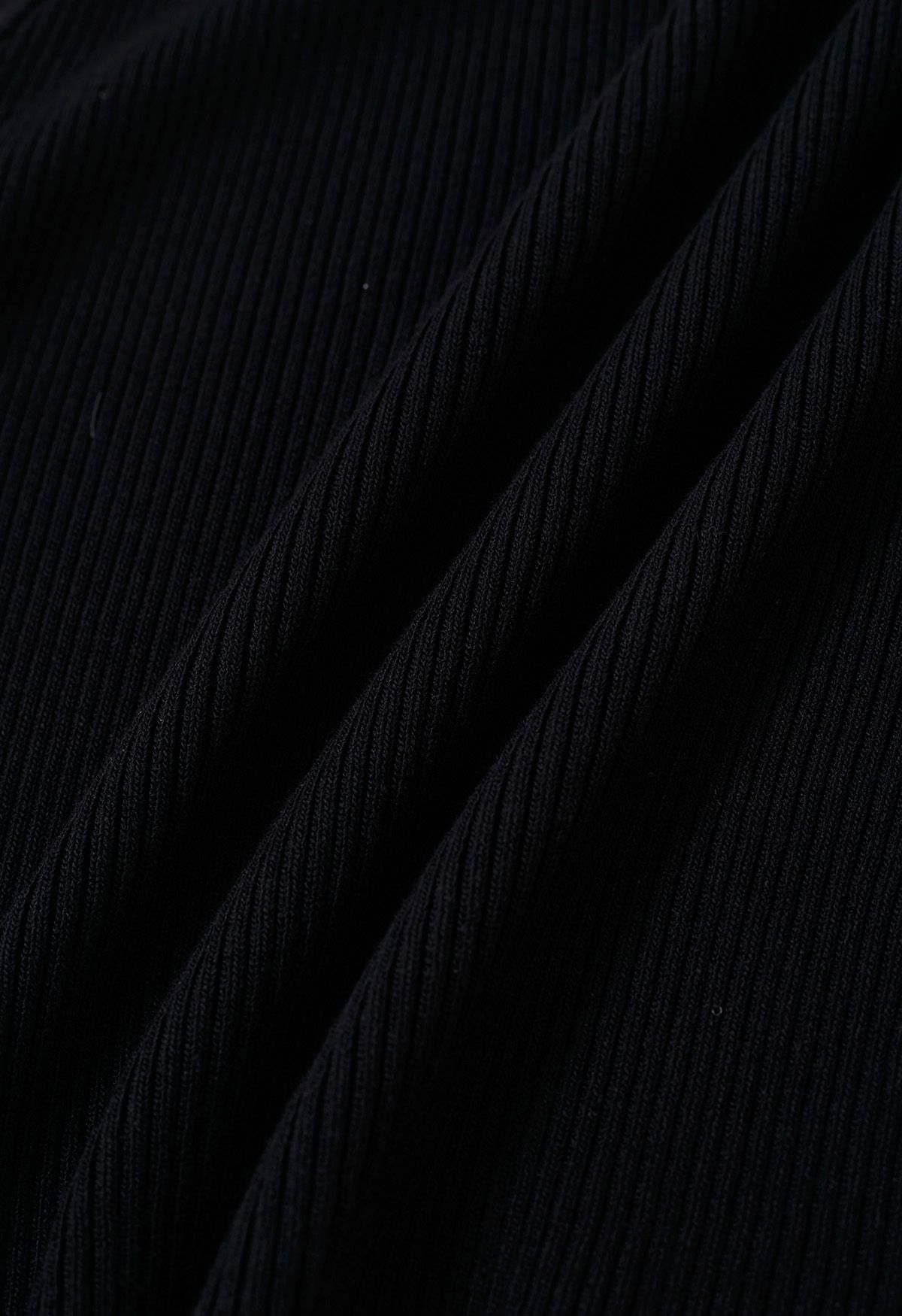 Ärmelloses Stricktop mit Schleifendekor in Schwarz