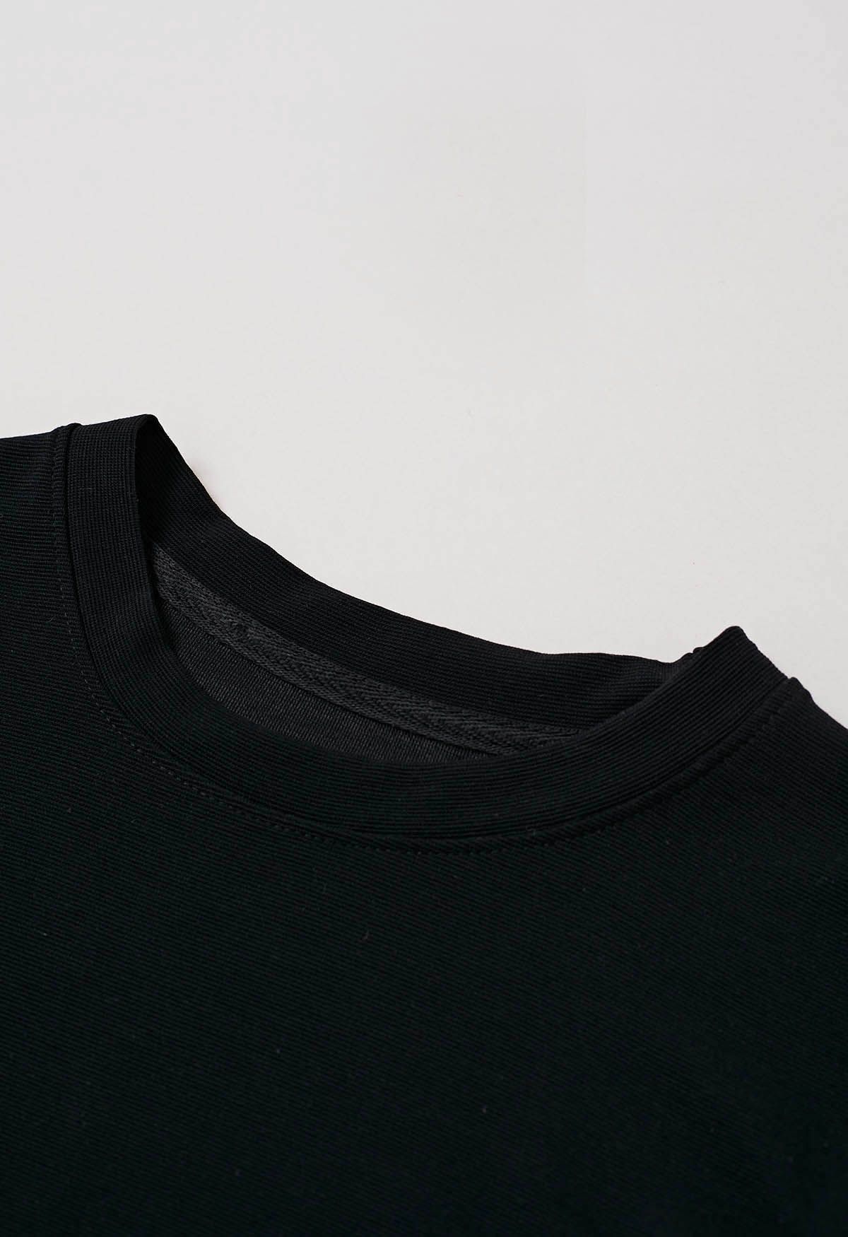 Kurzärmliges T-Shirt mit Twist-Detail in Schwarz