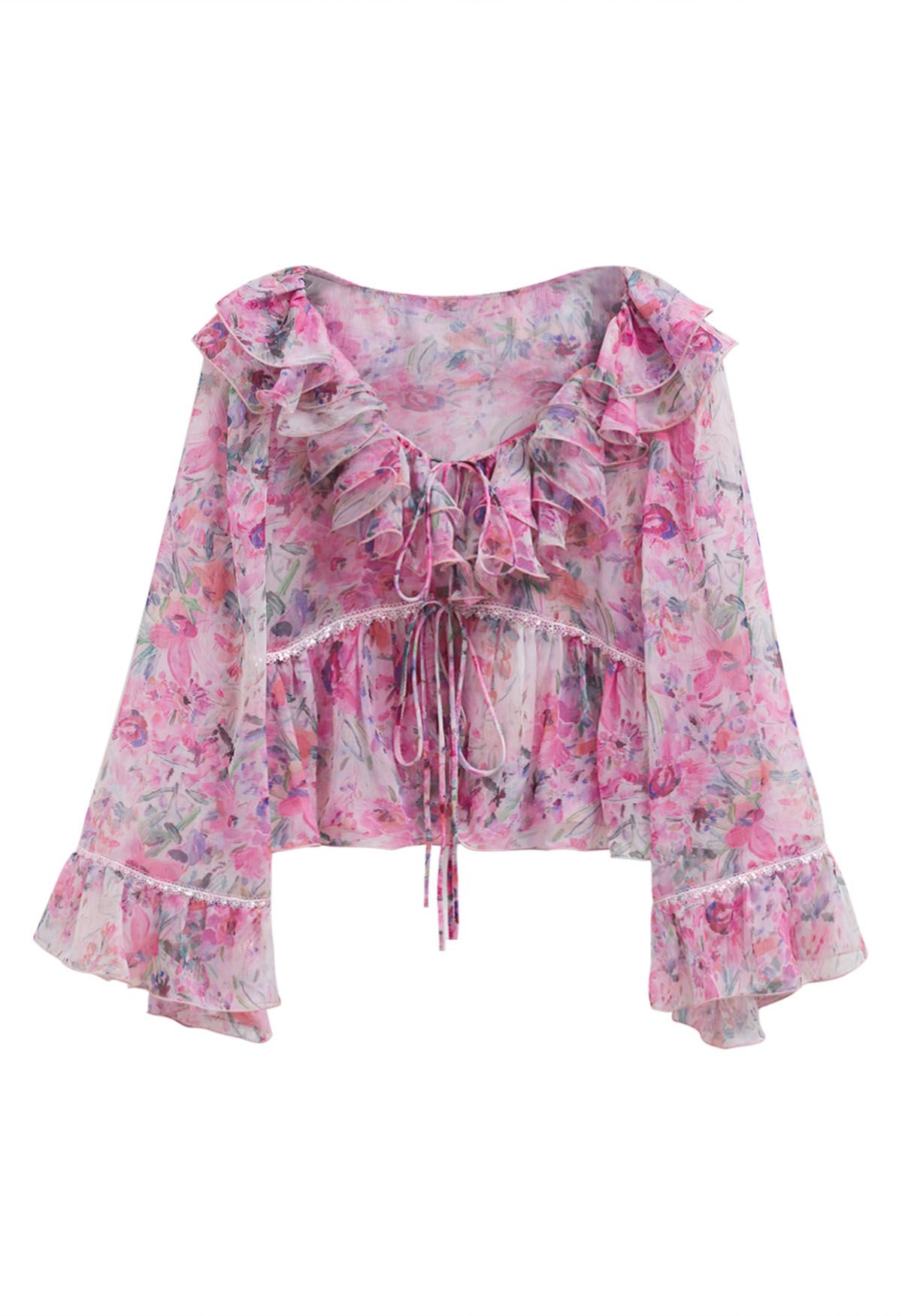 Transparentes Top mit Rüschen und Glockenärmeln in Rosa mit Aquarellblumen