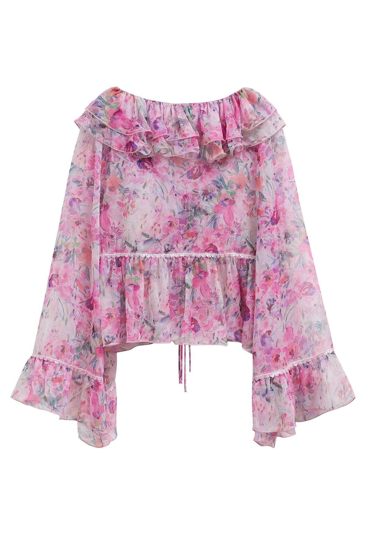 Transparentes Top mit Rüschen und Glockenärmeln in Rosa mit Aquarellblumen