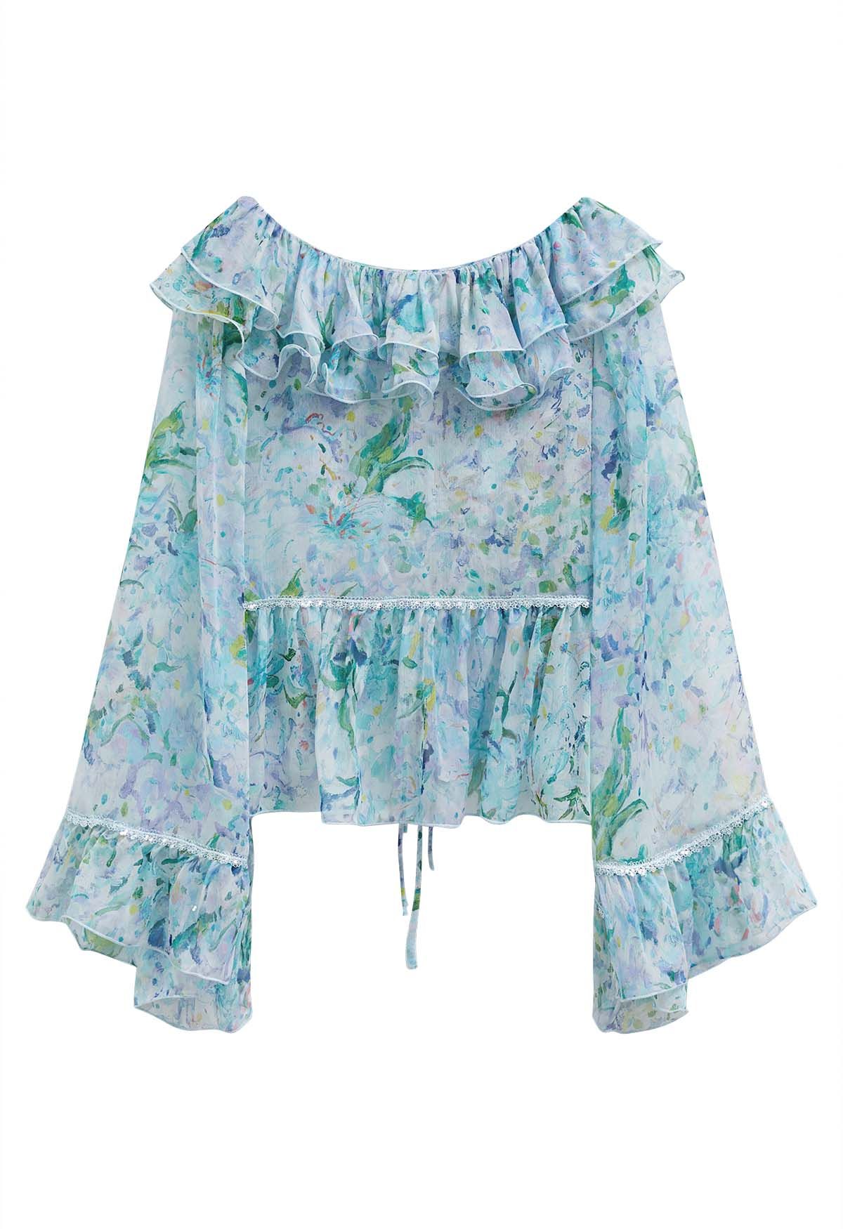 Transparentes Top mit Rüschen und Glockenärmeln in Aquarell-Blumenmuster in Blau