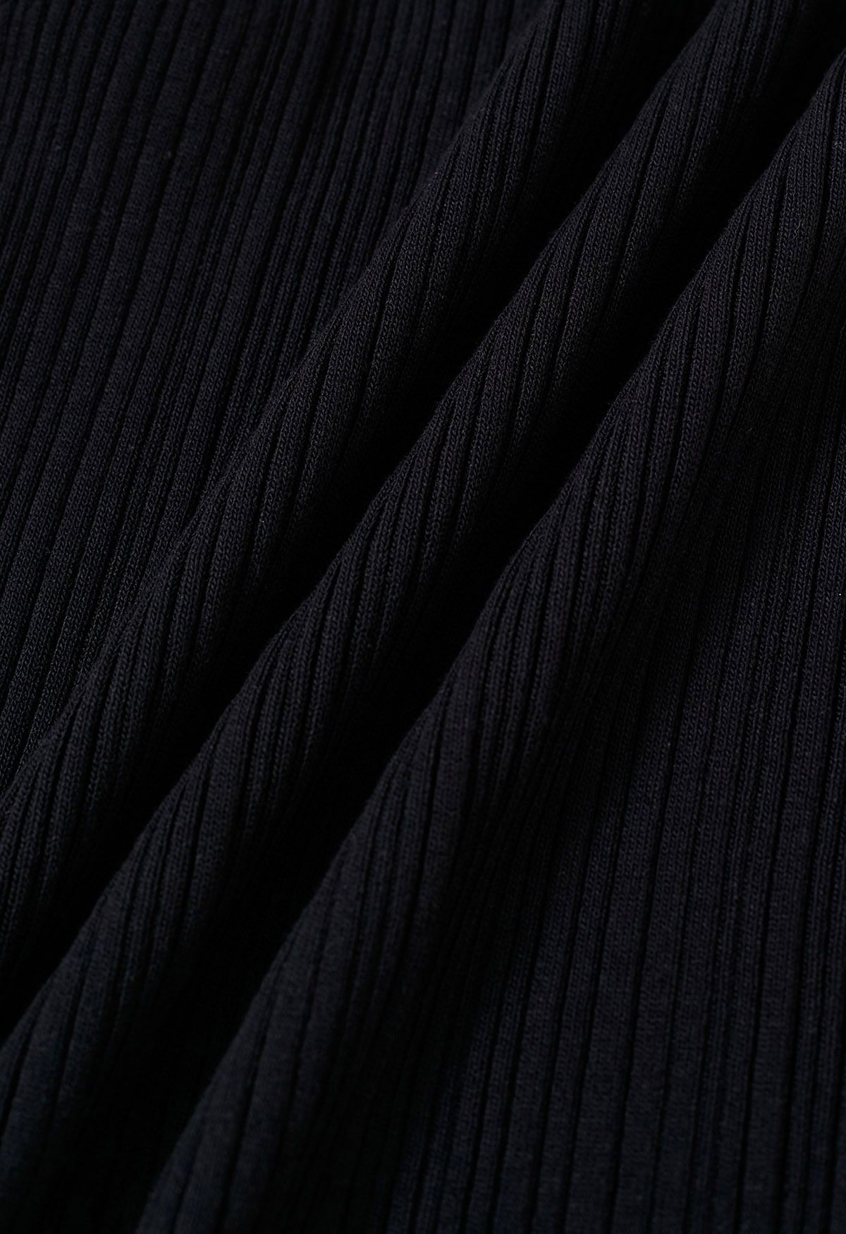 Minimalistisches, ärmelloses Stricktop mit gerippter Struktur in Schwarz