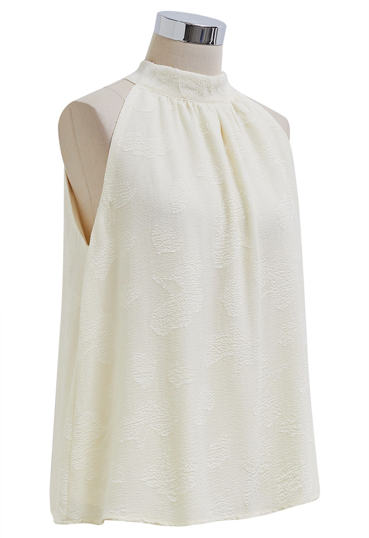 Neckholder-Top mit Schleife und Blumenprägung in Creme