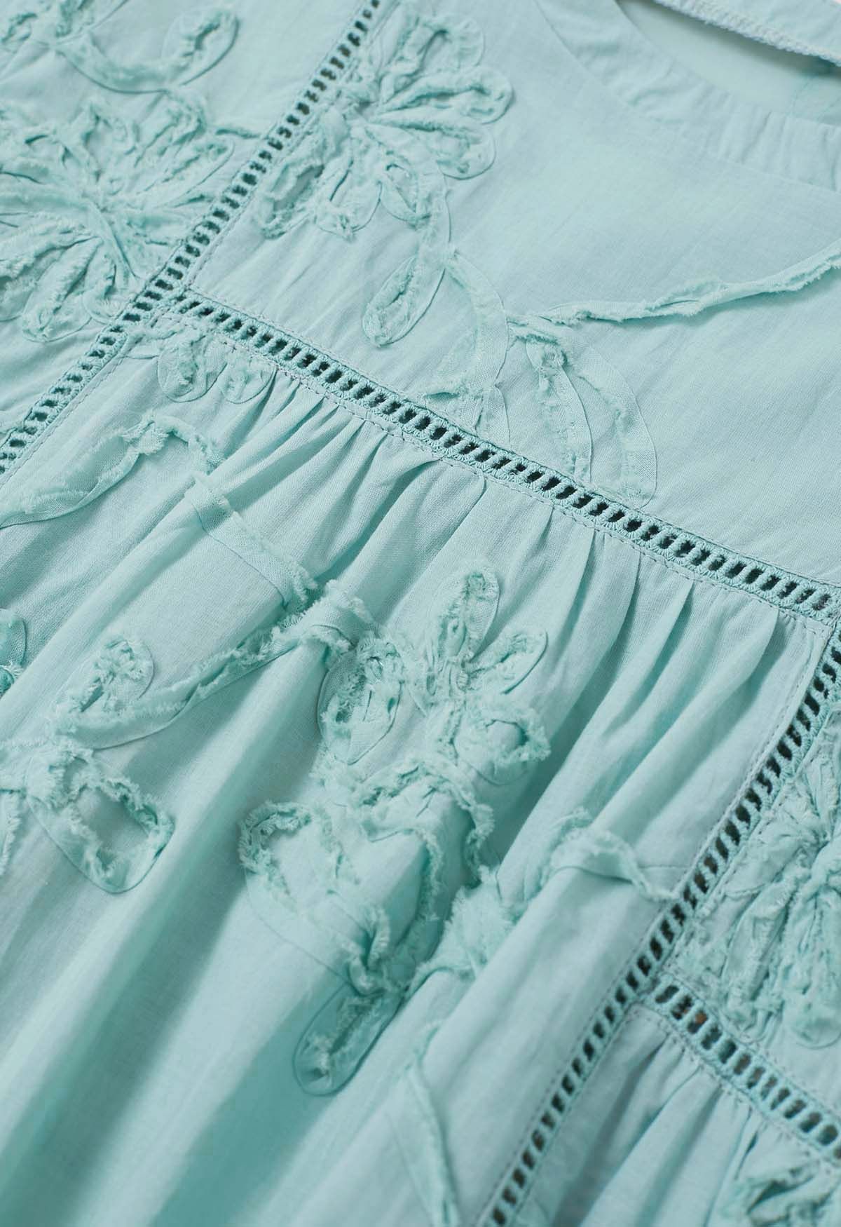 Ärmelloses Dolly-Top mit 3D-Blumenmuster und Raw-Detail in Mint