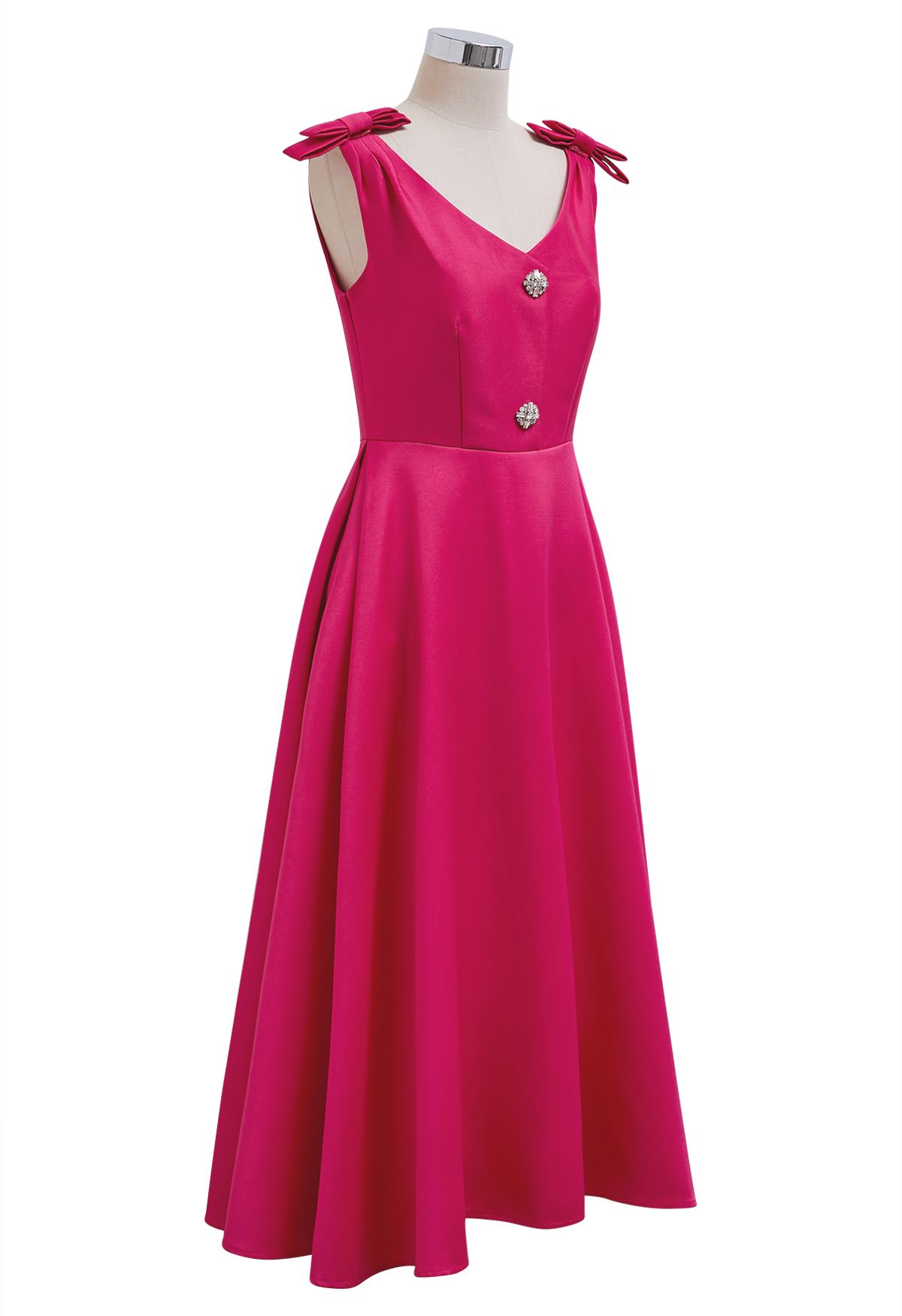 Midikleid mit Schleife an der Schulter und Zirkonia-Knöpfen in Magenta