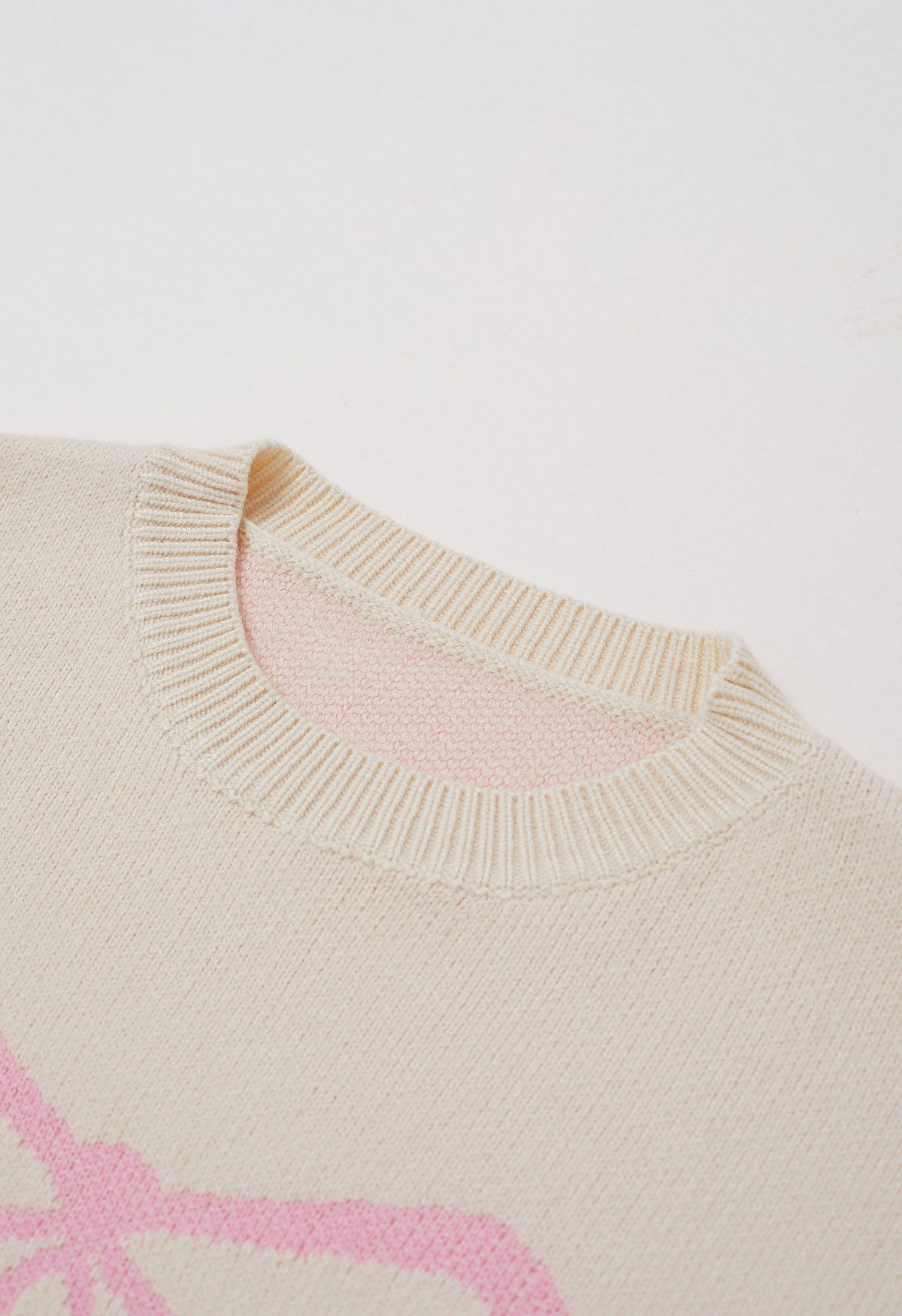 Jacquard-Strickpullover mit Schleifenmuster in Creme