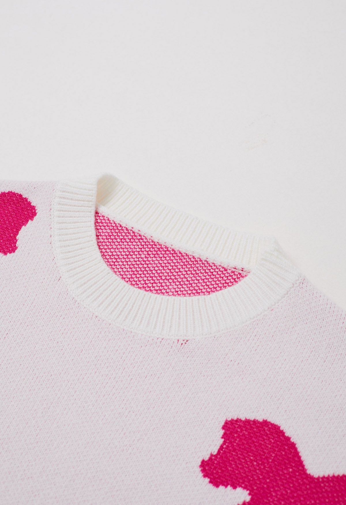 Rosa Jacquard-Strickpullover mit Cartoon-Schleife