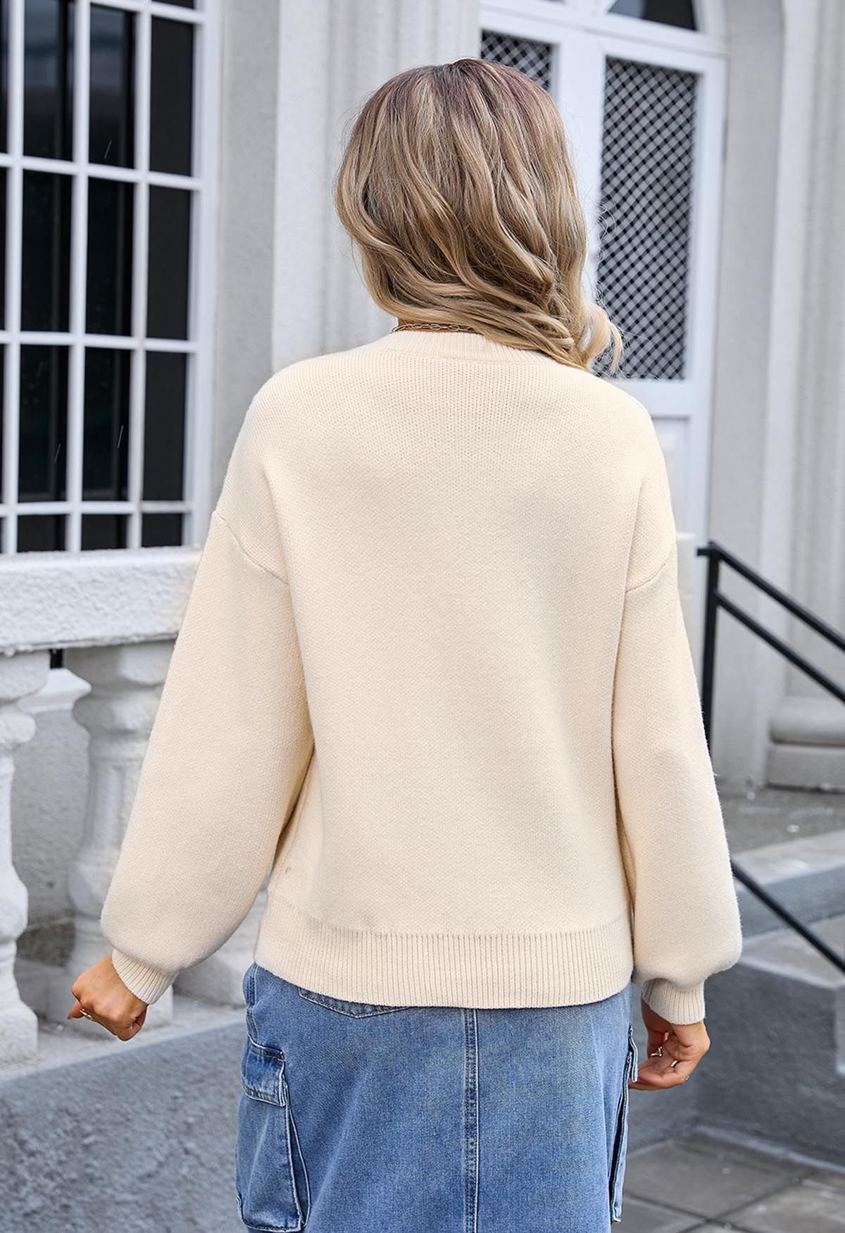 Jacquard-Strickpullover mit Schleifenmuster in Creme