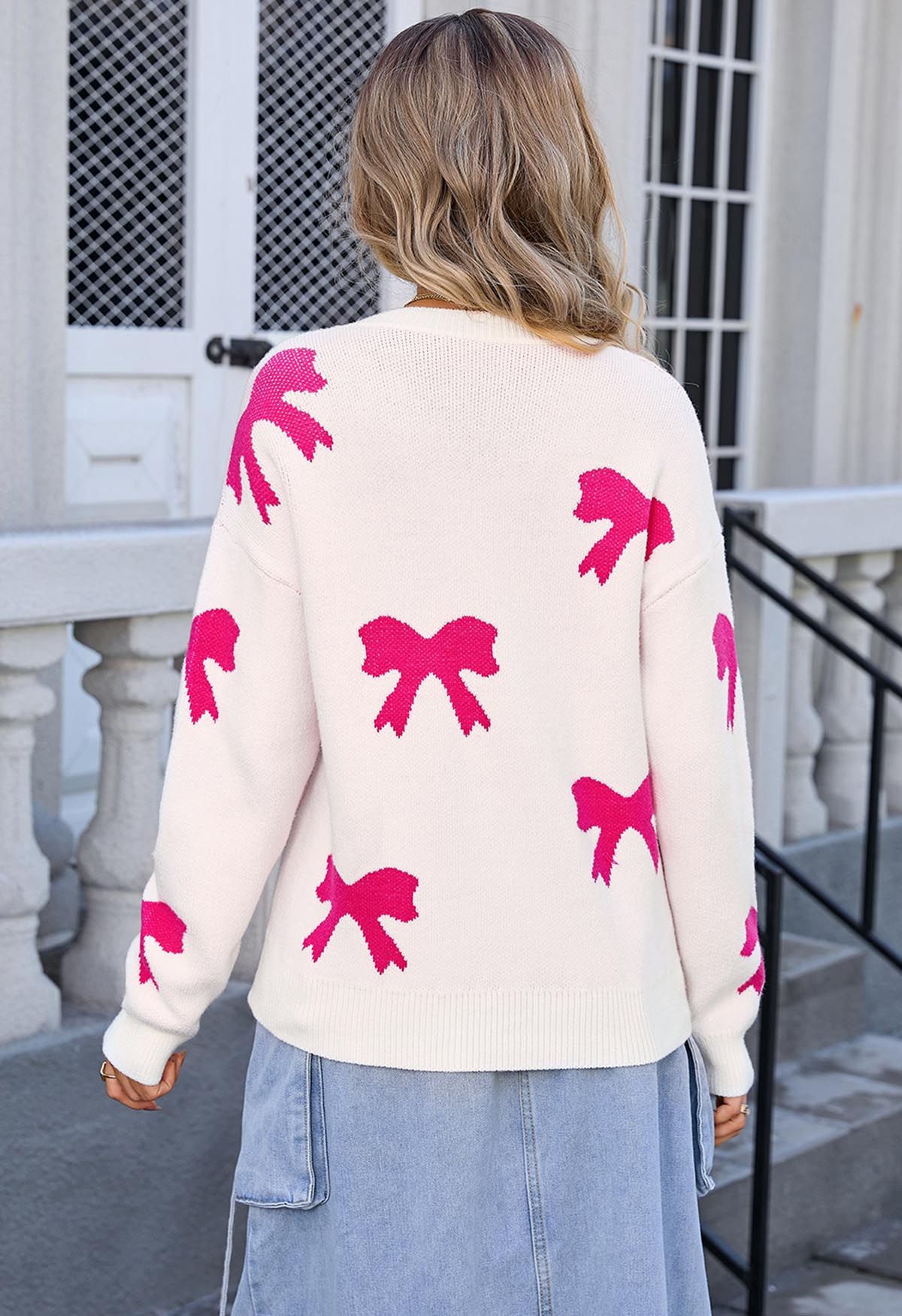 Rosa Jacquard-Strickpullover mit Cartoon-Schleife