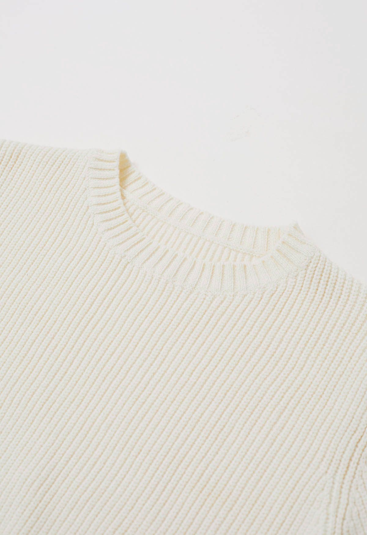 Gerippter Strickpullover mit Bindeband auf der Rückseite in Creme