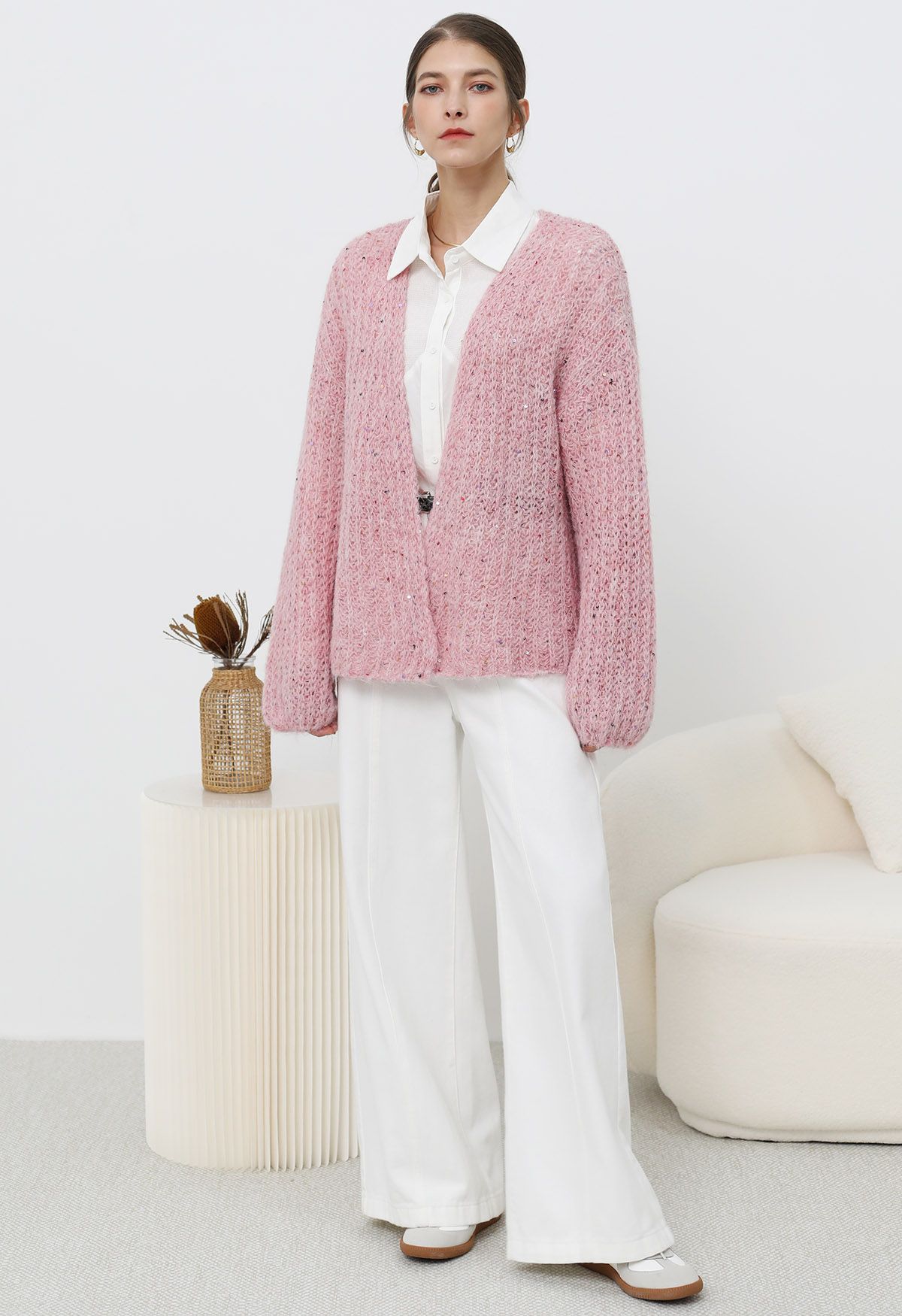 Gemütliche Strickjacke mit offener Vorderseite und bunten Pailletten in Pink