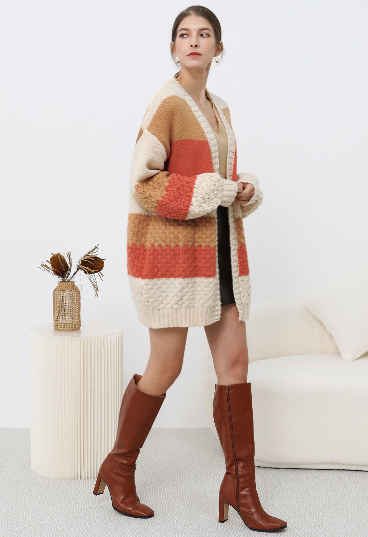 Strickjacke mit Puffärmeln und Farbblockdesign in warmen Farbtönen