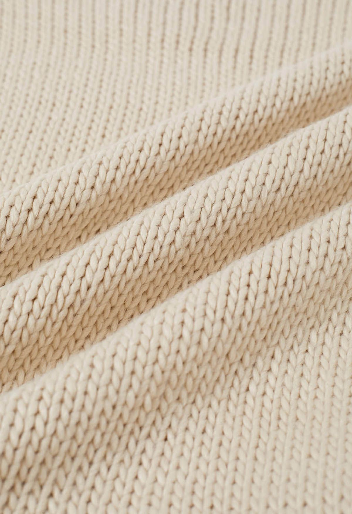 Faszinierendes ärmelloses Stricktop mit Rollkragen und Fransen