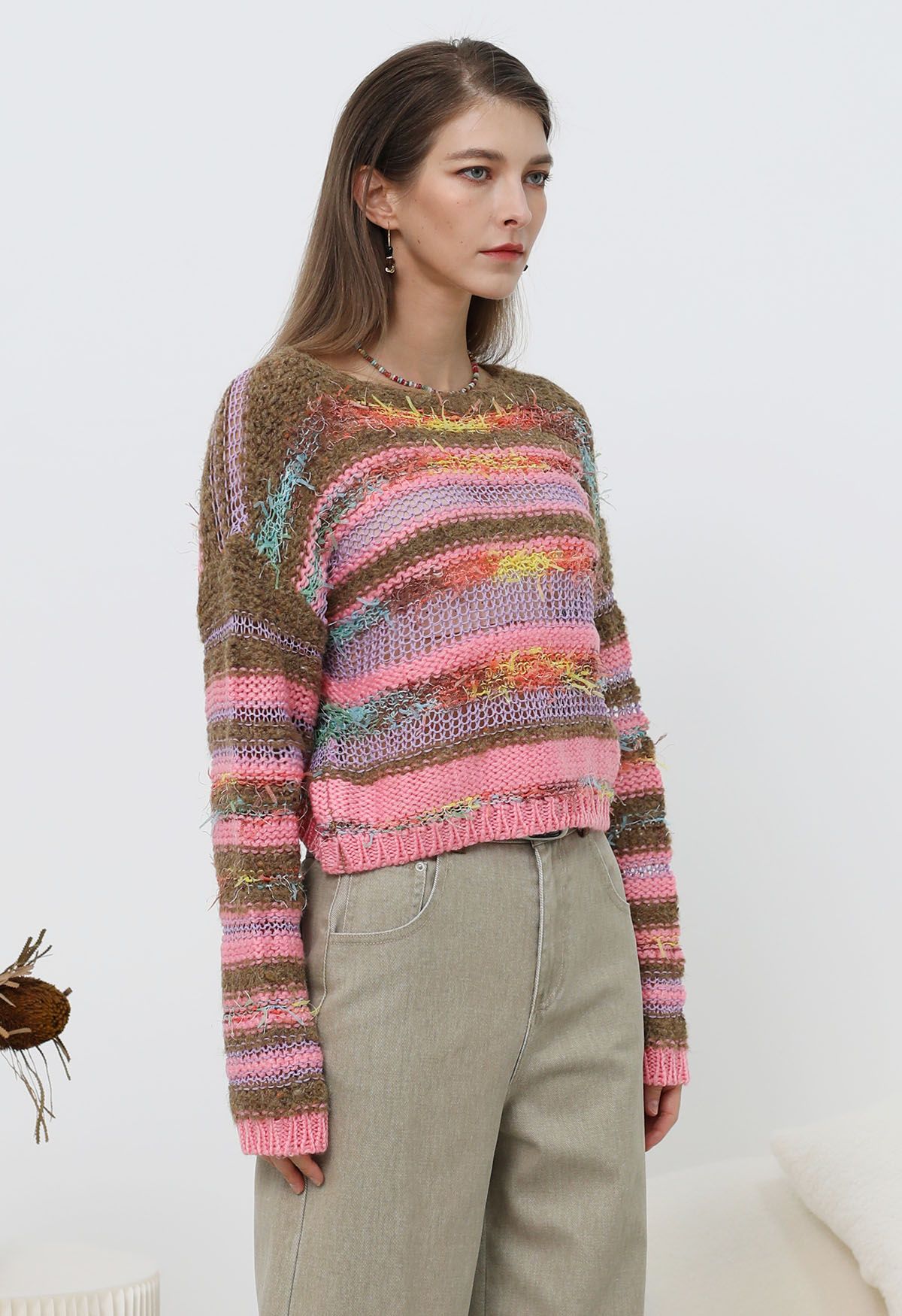 Mehrfarbig gestreifter Pointelle-Strickpullover mit Fransen in Pink