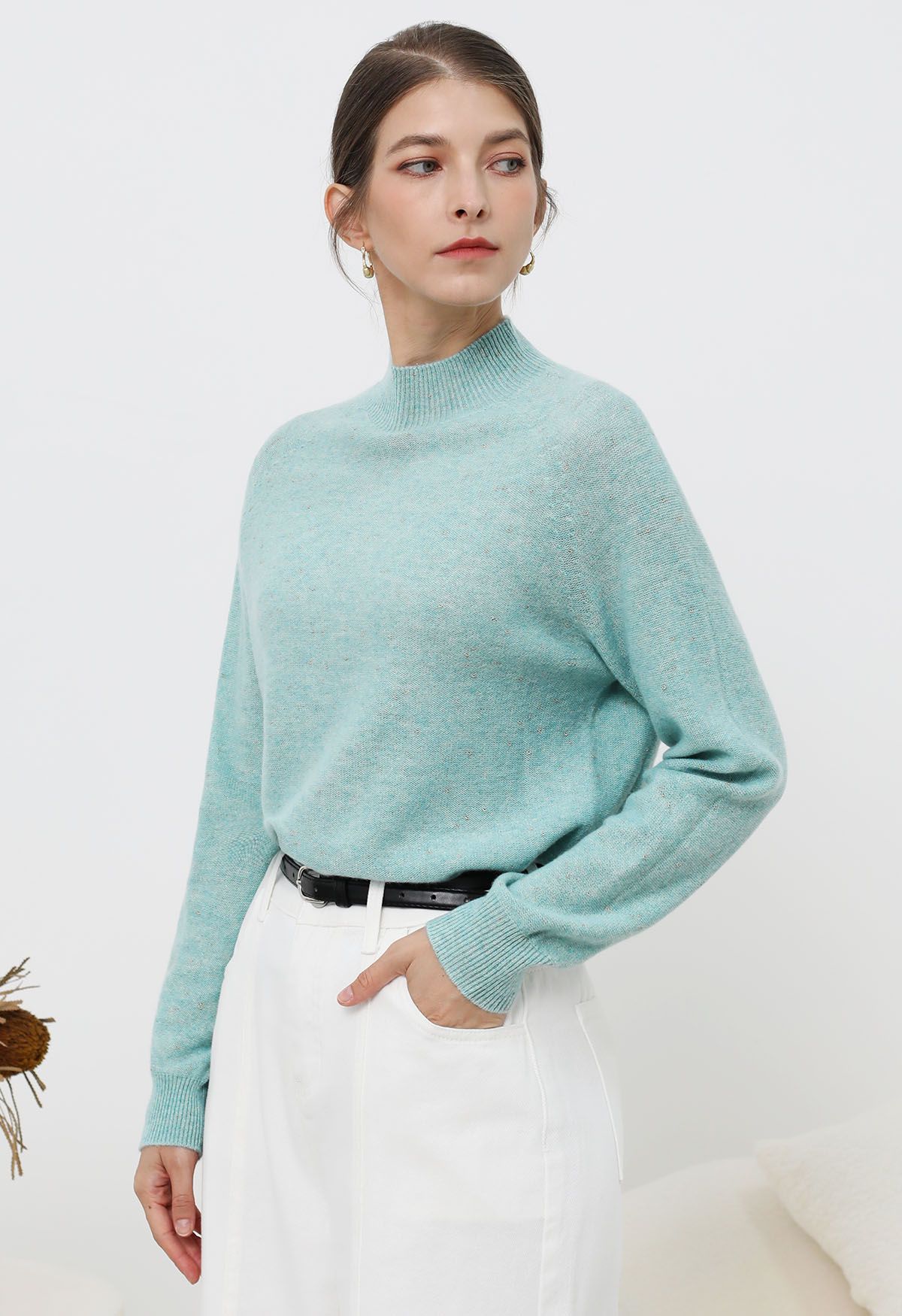 Wollpullover mit Rollkragen und integriertem Metallic-Faden in Mintgrün