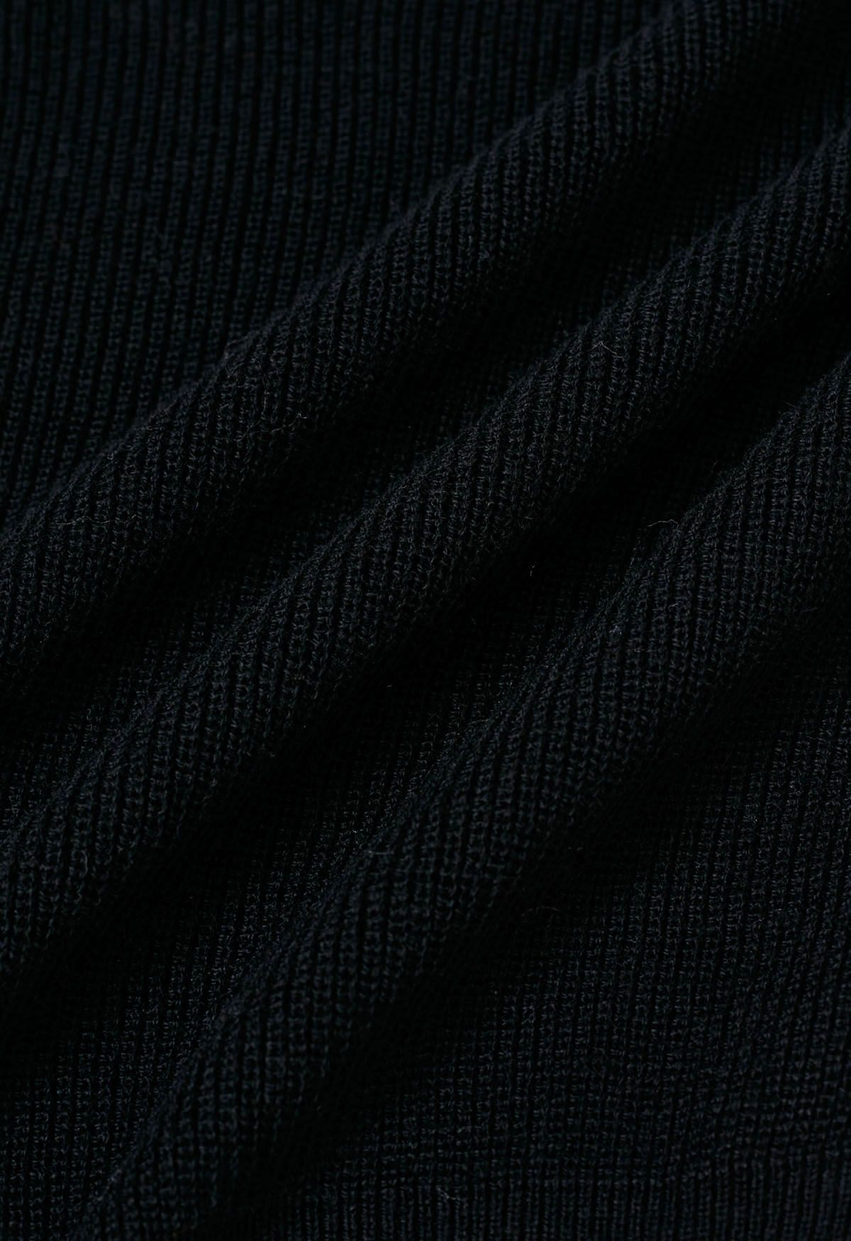 Strickjacke mit kontrastierendem Knopfbesatz in Schwarz