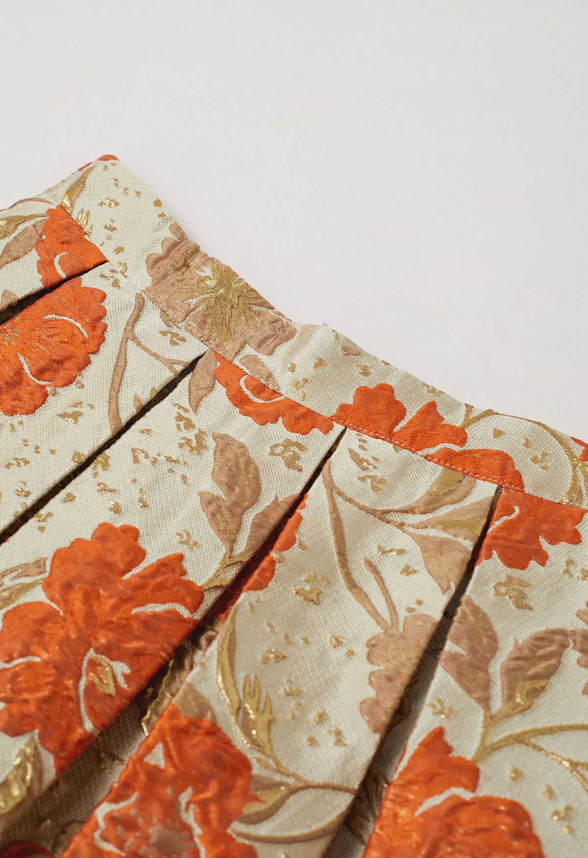 Ausgestellter Midirock aus Jacquard mit kunstvollem Blumenmuster in Orange