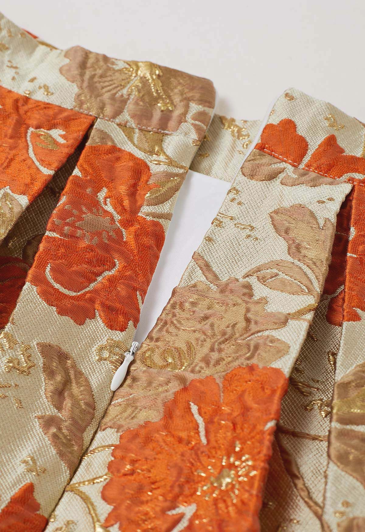 Ausgestellter Midirock aus Jacquard mit kunstvollem Blumenmuster in Orange