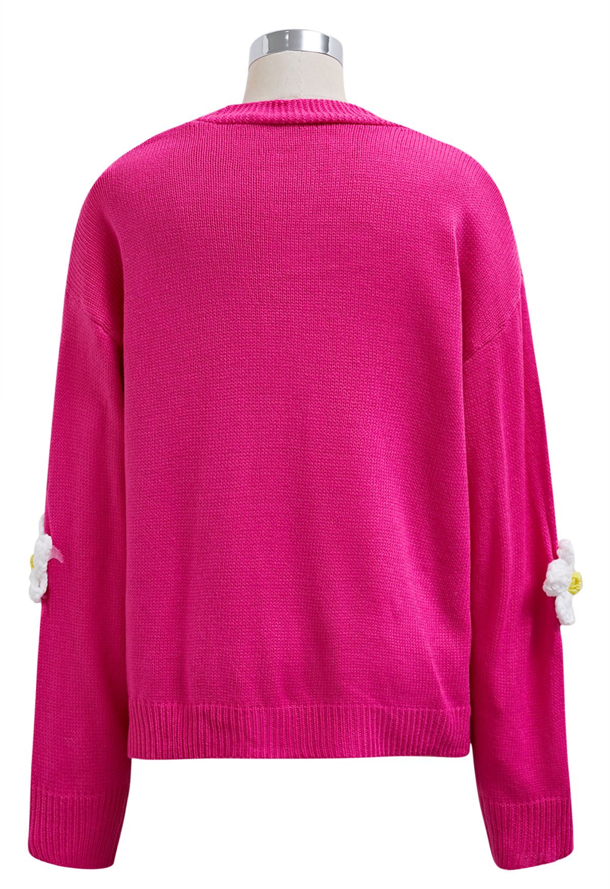 Hübsche Strickjacke mit 3D-Blumenknöpfen in Magenta