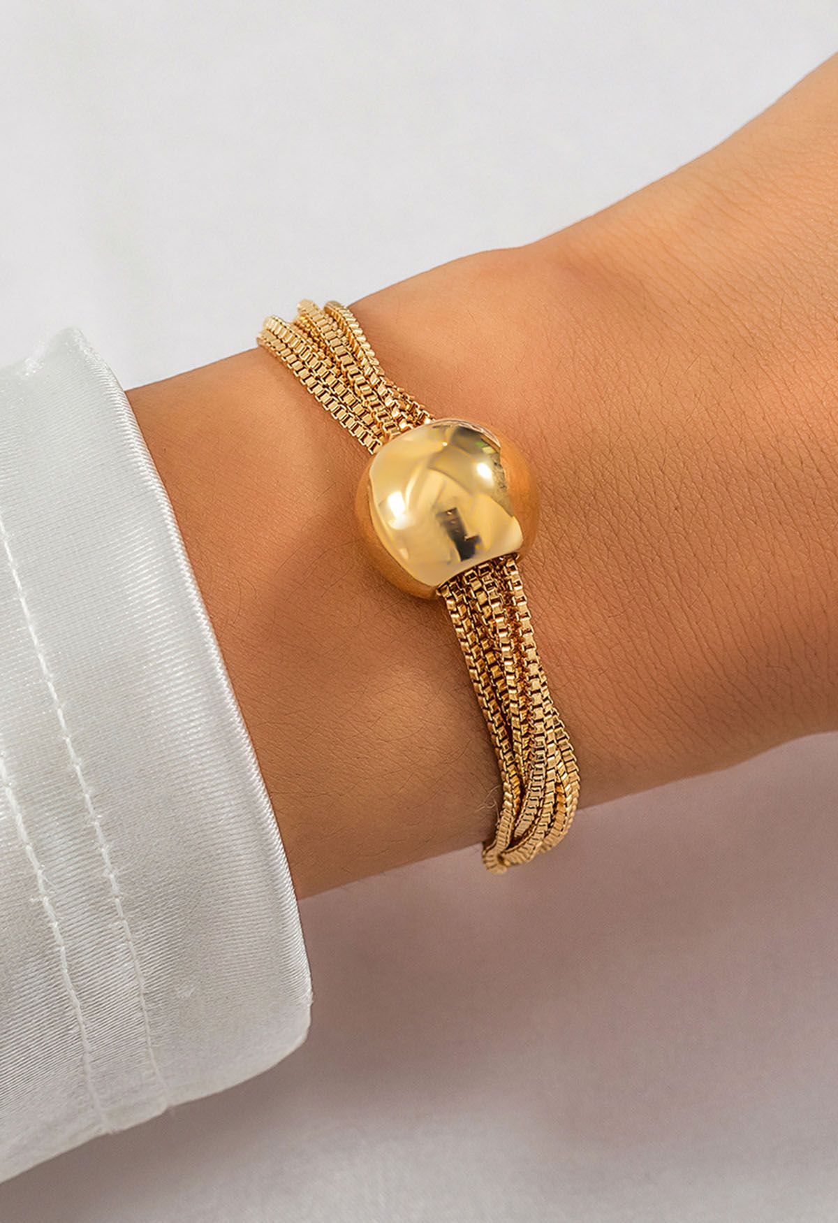 Mehrlagiges Kettenarmband in Gold