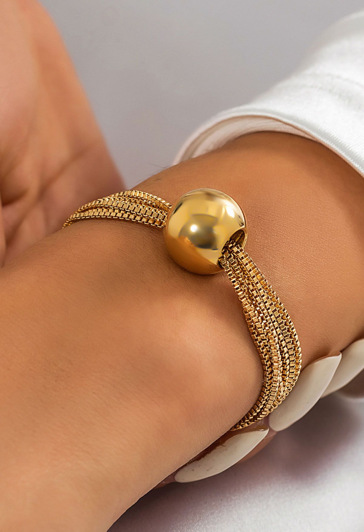 Mehrlagiges Kettenarmband in Gold