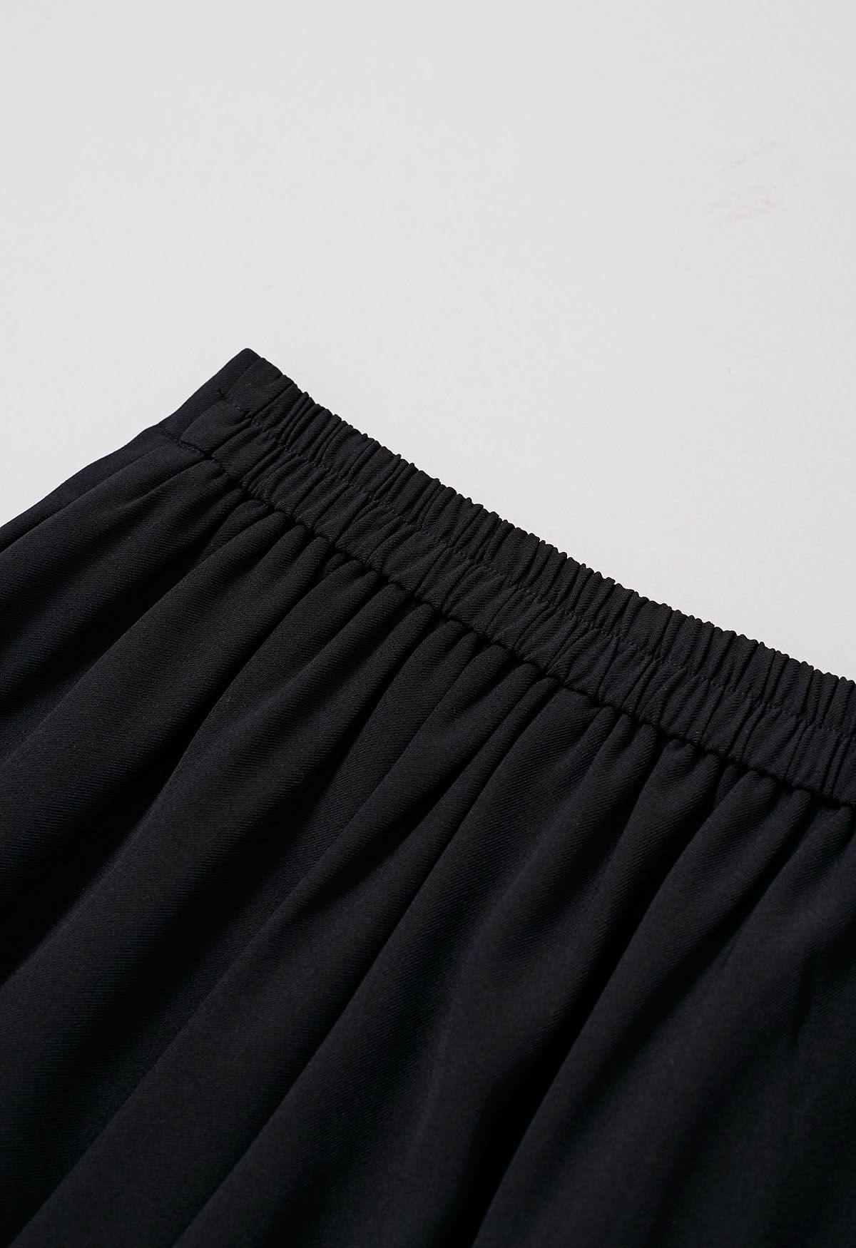 Mühelose, elegante Palazzo-Hose mit geknöpften Falten in Schwarz