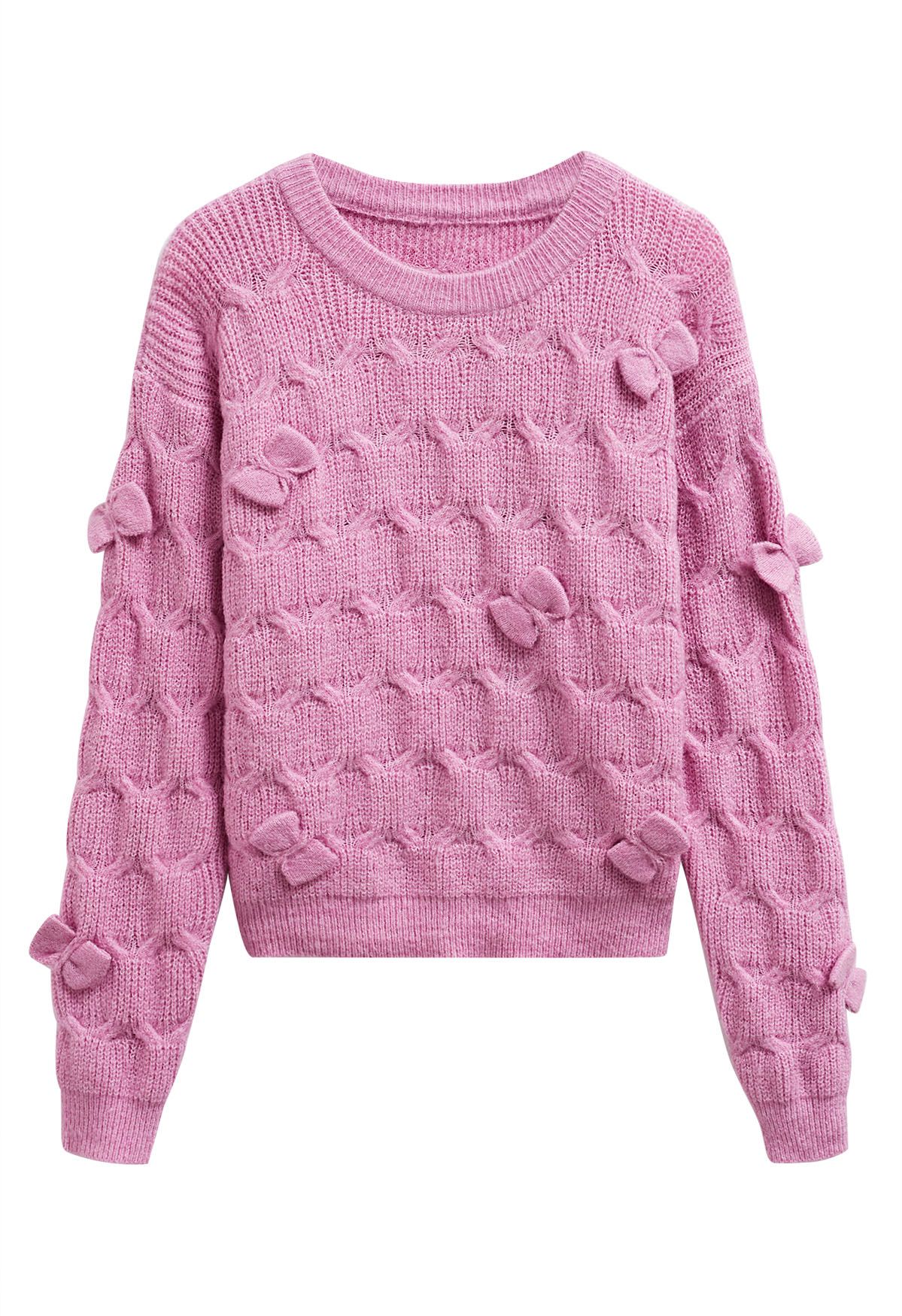 Verspielter Strickpullover mit geometrischer Schleife in Rosa