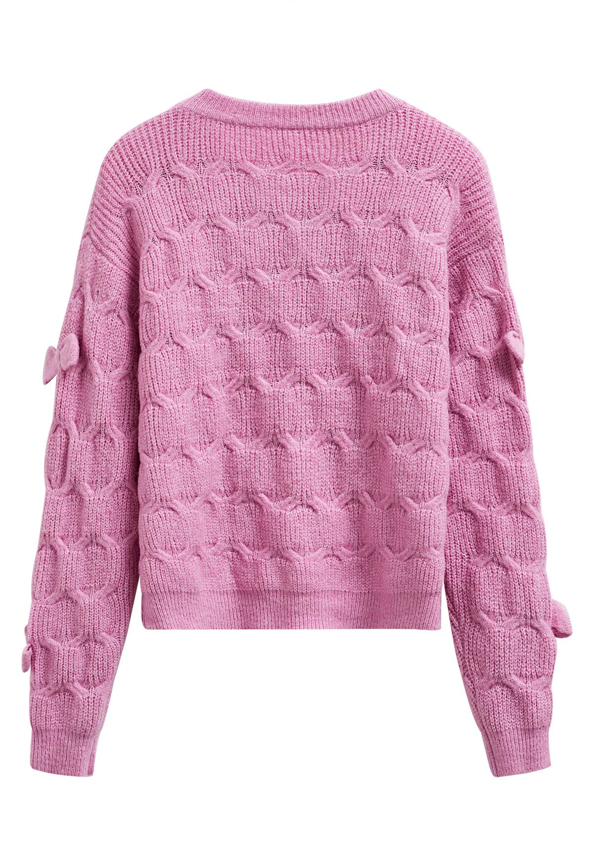 Verspielter Strickpullover mit geometrischer Schleife in Rosa