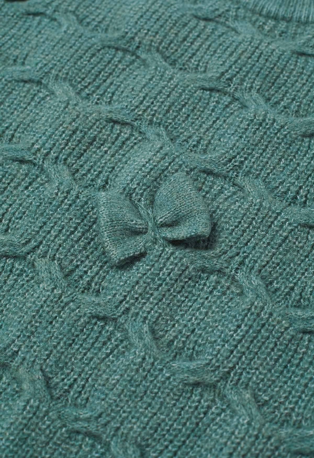 Verspielter Strickpullover mit geometrischer Schleife in Grün