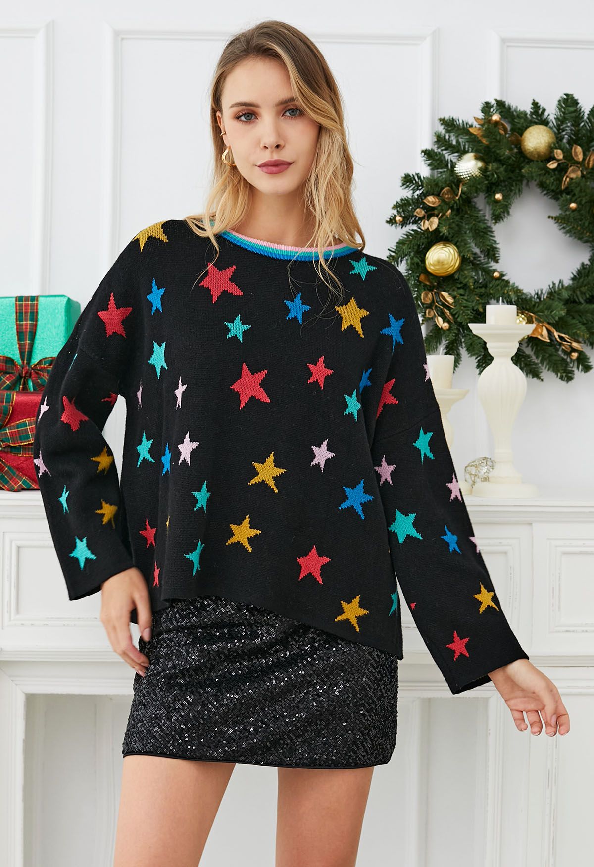 Cosmic Charm – Schwarzer Strickpullover mit Glockenärmeln und Sternen