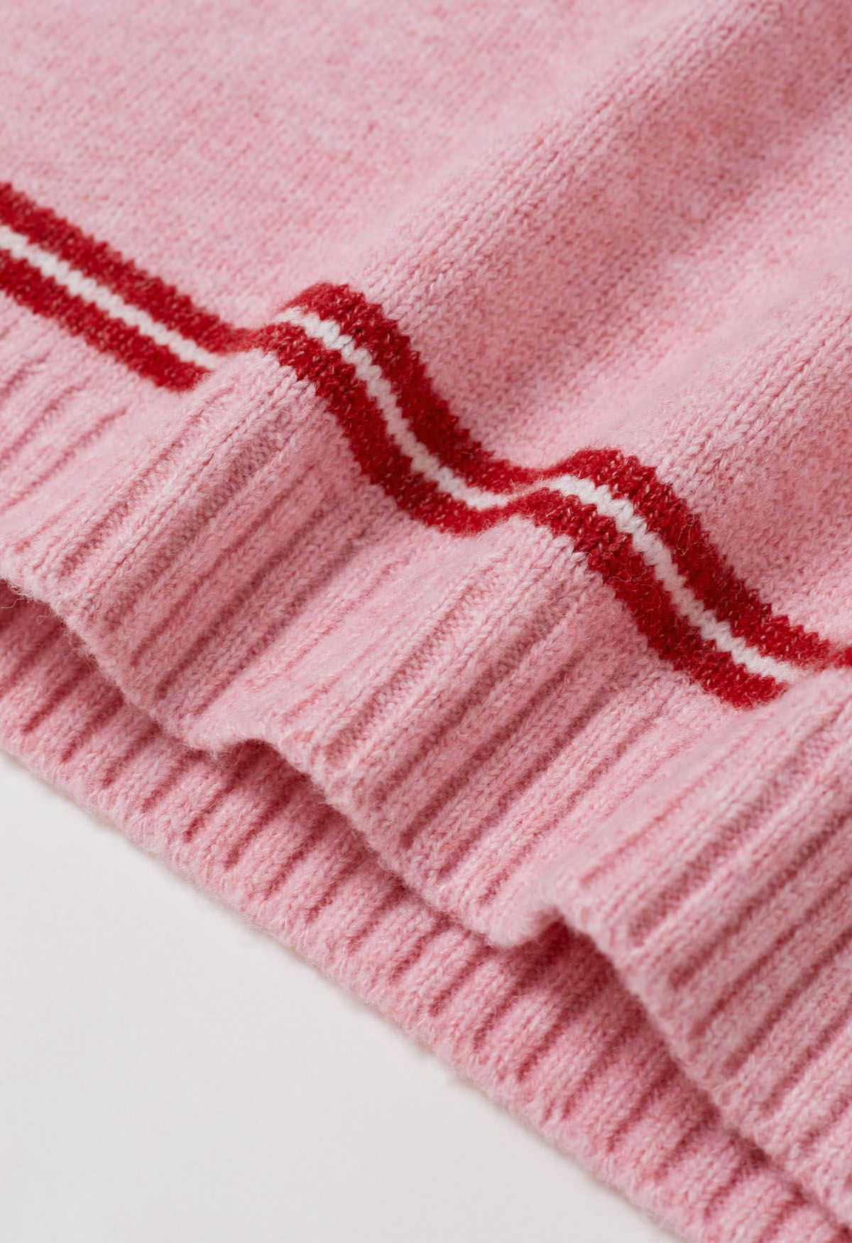 Sportlicher Strickpullover mit Streifen und halbem Reißverschlusskragen in Rosa