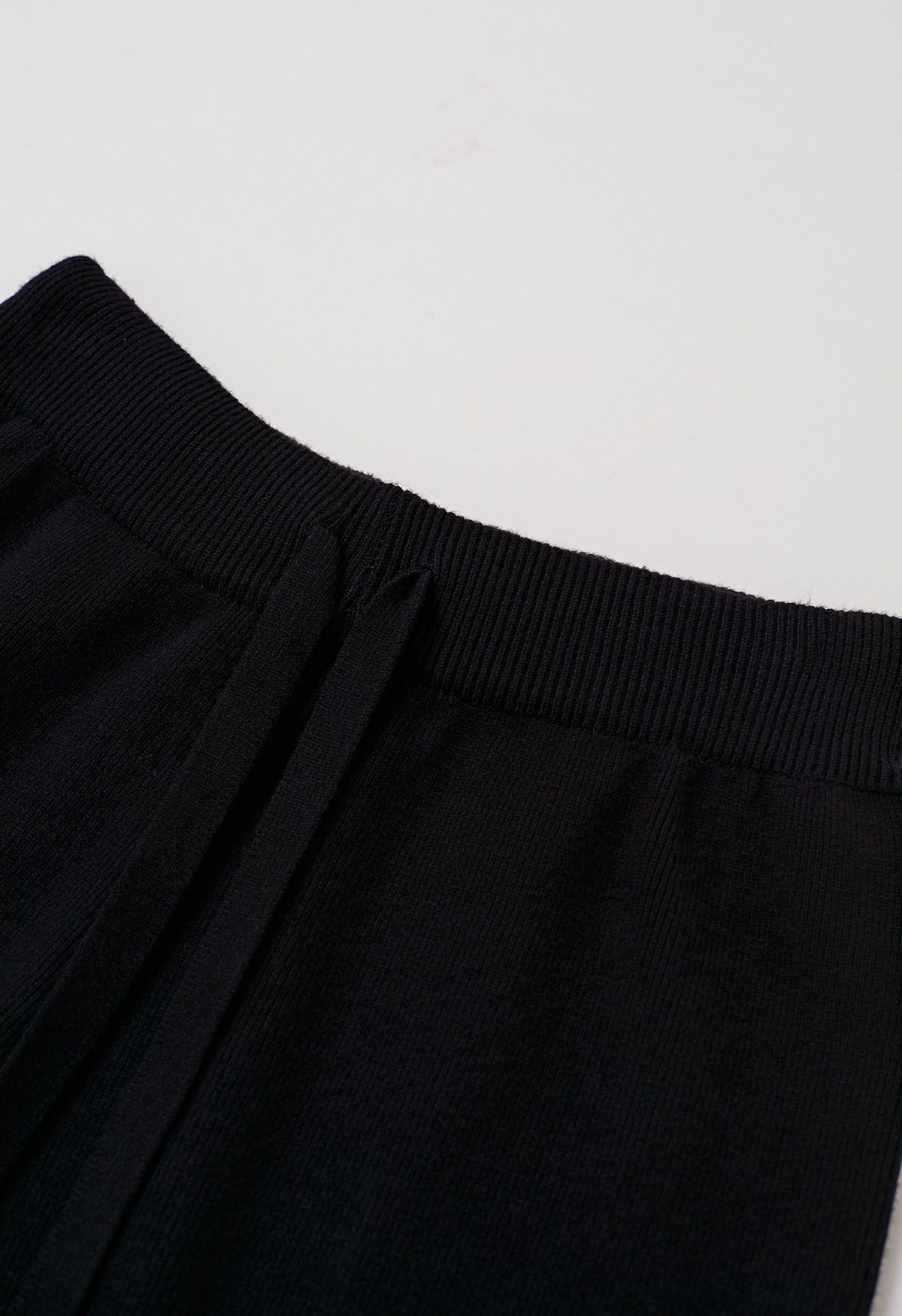 Lässige Strickhose mit Fransen und Bindeband in Schwarz