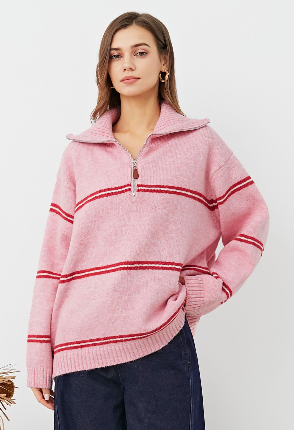 Sportlicher Strickpullover mit Streifen und halbem Reißverschlusskragen in Rosa