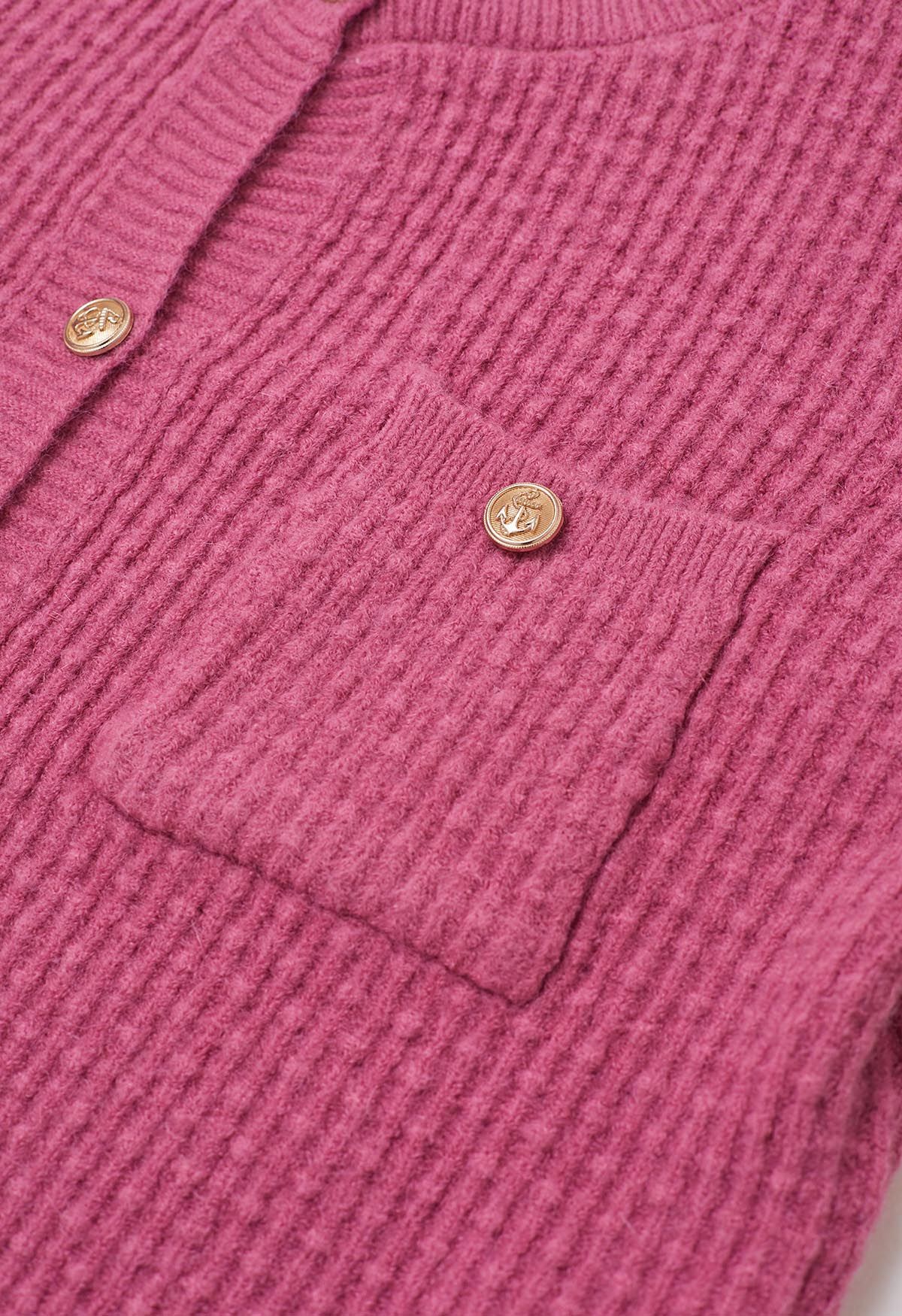 Strickjacke mit aufgesetzten Taschen und Knöpfen, geprägten Punkten in Rosa