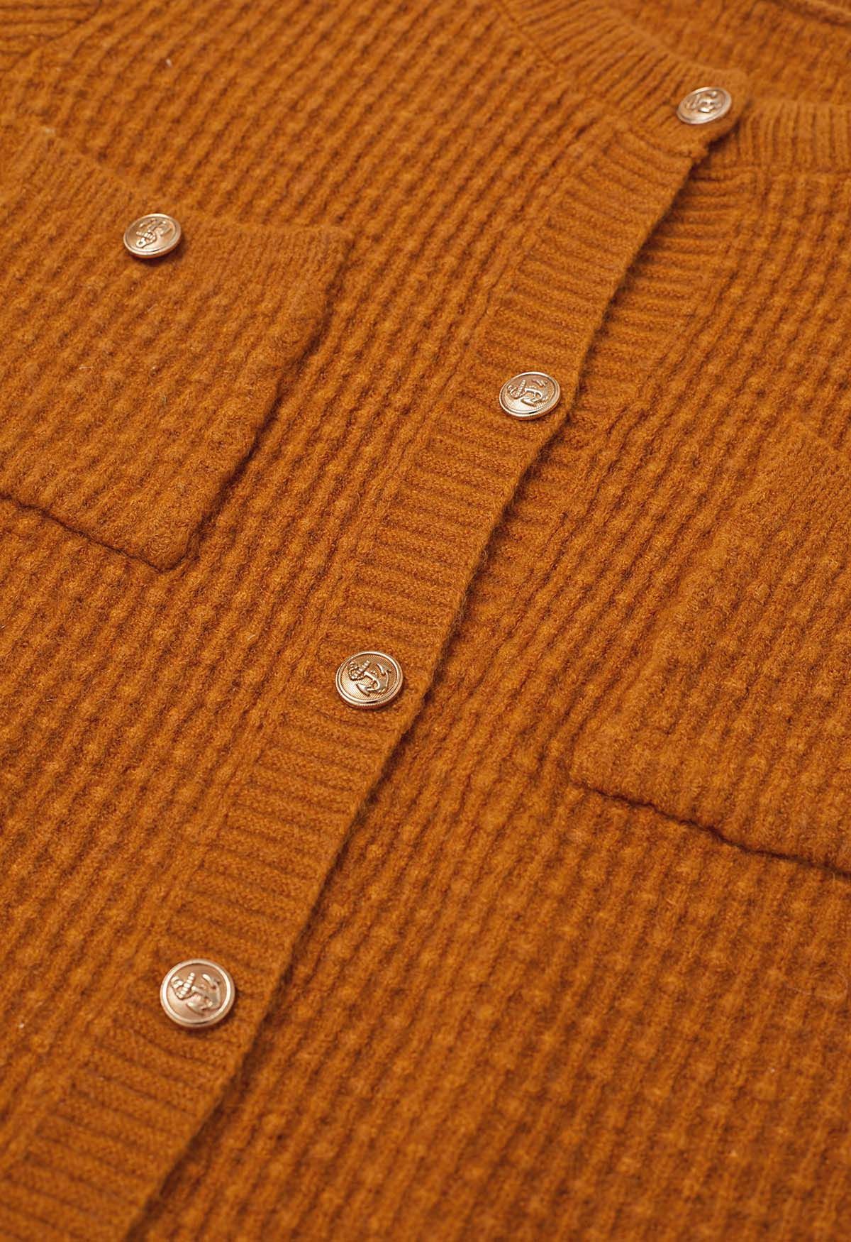 Strickjacke mit aufgesetzten Taschen und Knöpfen, geprägten Punkten in Orange