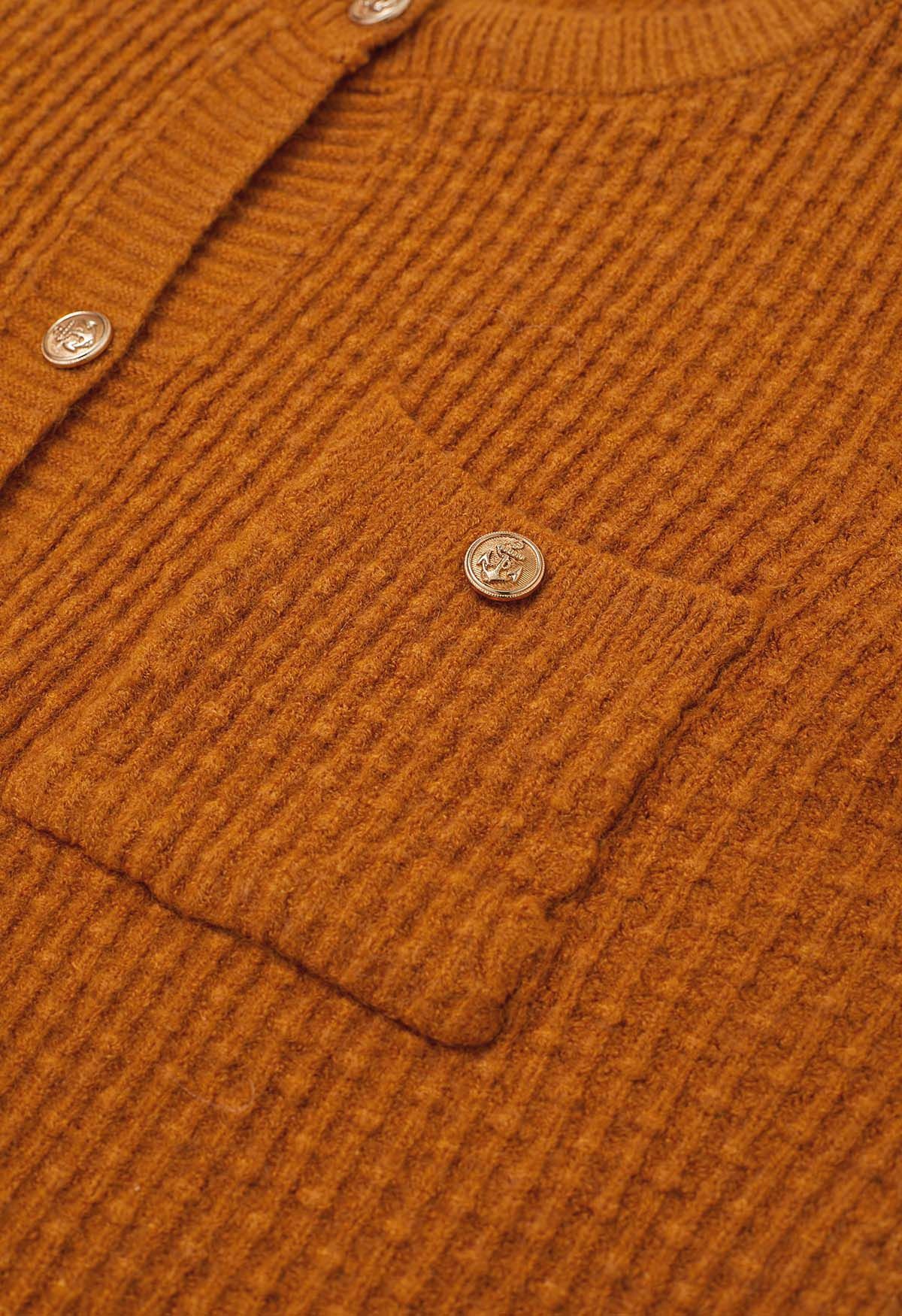 Strickjacke mit aufgesetzten Taschen und Knöpfen, geprägten Punkten in Orange