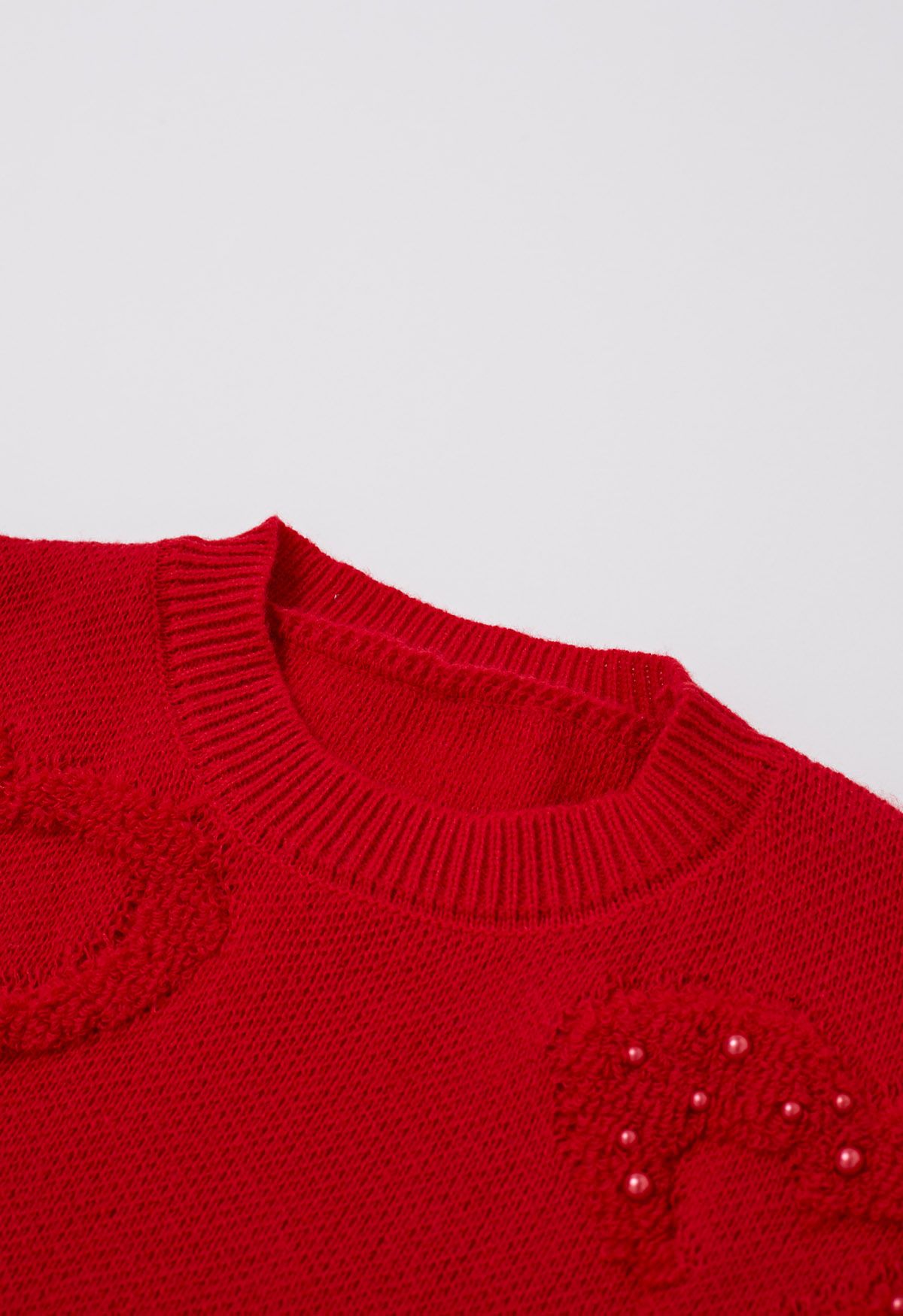 Übergroßer Jacquard-Strickpullover mit Perlenbesatz und Herzen in Rot