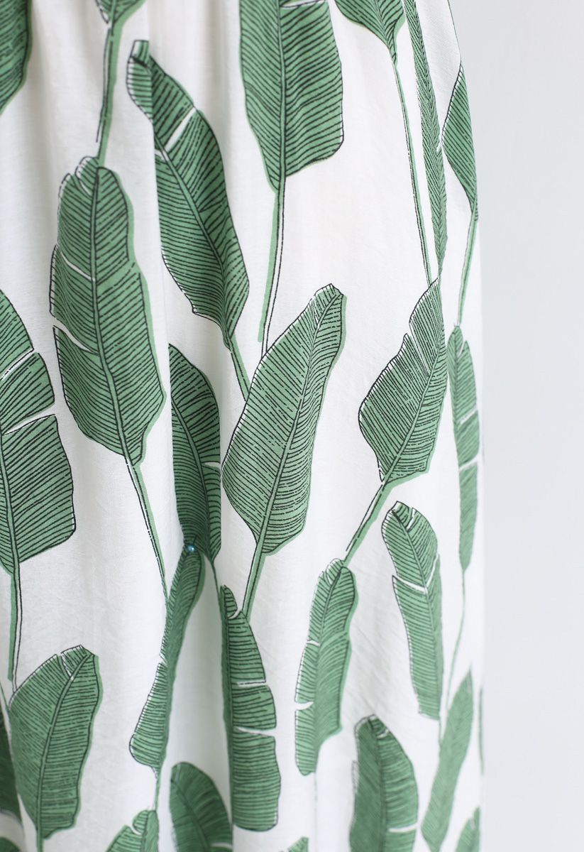 Sommerpalme – Grünes Maxikleid mit Nackenband und Blattmuster
