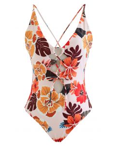 Vorne und hinten geschnürter Badeanzug mit orangefarbenem Blumenmuster