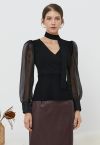 Gespleißtes Stricktop mit transparenten Ärmeln und Schal in Schwarz