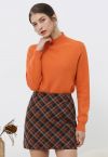 Wollpullover mit Rollkragen und integriertem Metallic-Faden in Orange