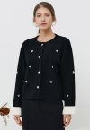 Schwarzer Cardigan mit kontrastierendem Nietenknopf und 3D-Herzenverzierung