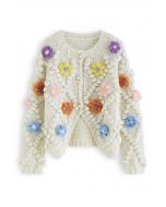 Geknöpfte Strickjacke mit Bommeln und Blumenmuster