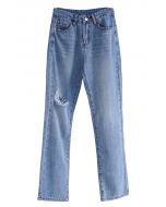 Hoch taillierte Jeans mit zerrissenen Details